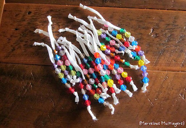 Colorful beads strung on pipe cleaners (Decoding Strategies)