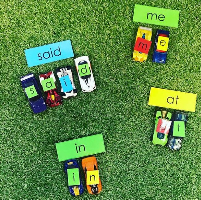 Toy cars with letters on the tops, put together to form words as an example of dollar store hacks for the classroom 