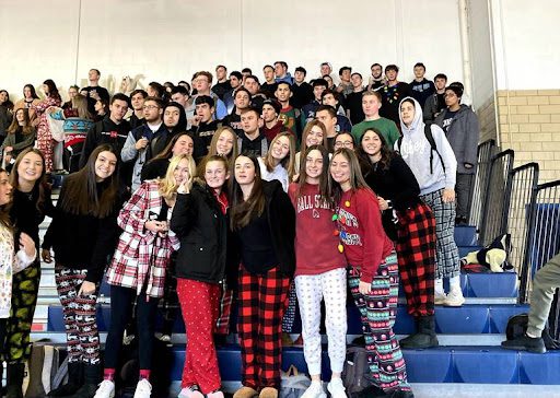 Students wearing pajamas, as an example of pep rally activities and games