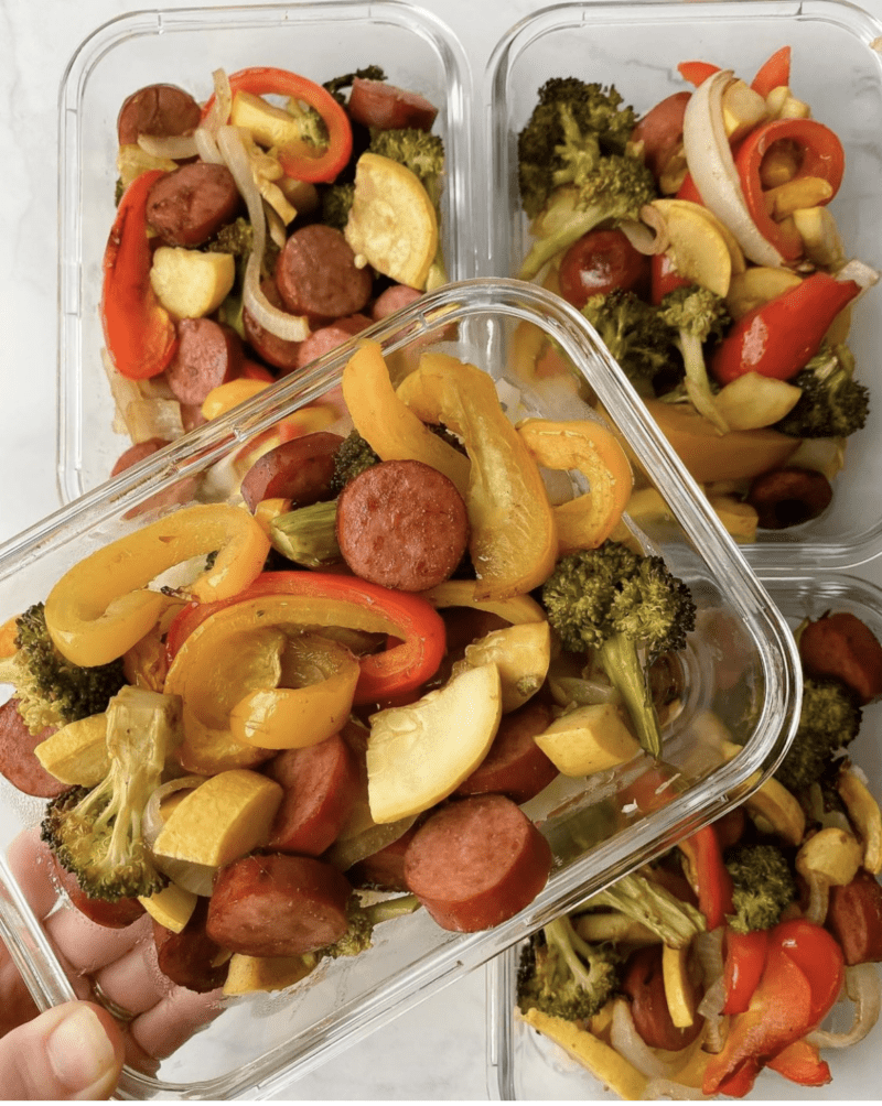 Sausage, peppers, and veggies in glass containers